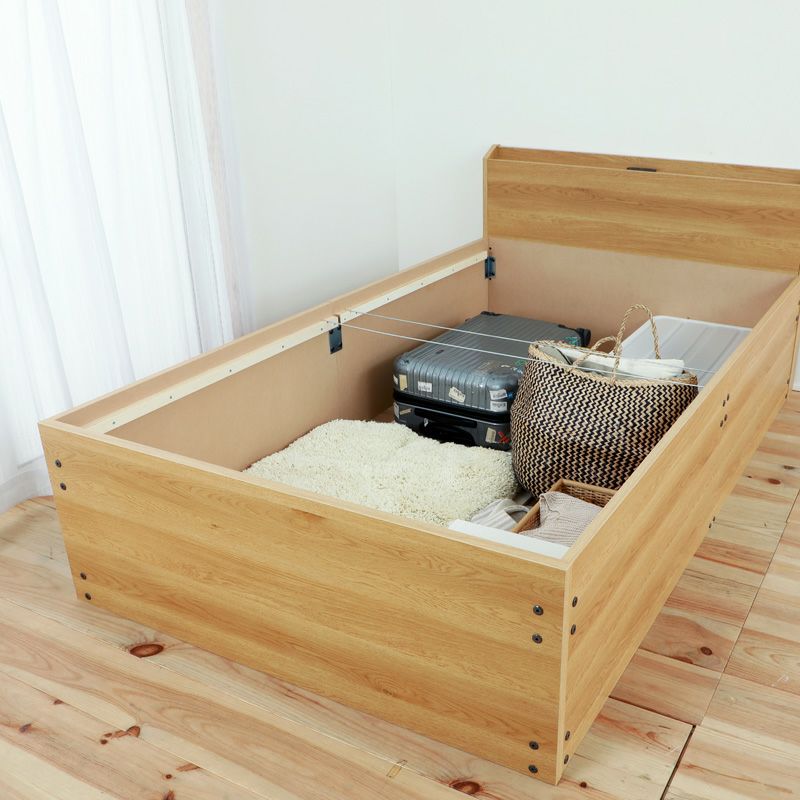 ベッド下がかさばるモノを収納できるスペースとなっている畳ベッド
